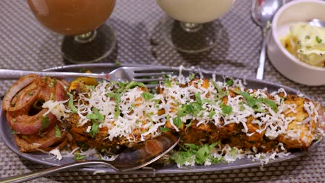 tandoori paneer with cheese served at dinner at restaurant from top angle