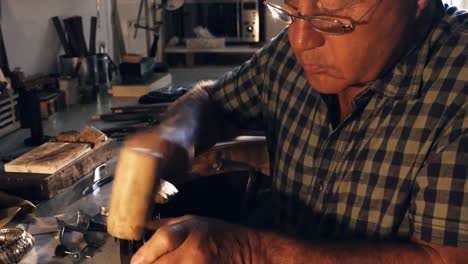 goldsmith preparing ring