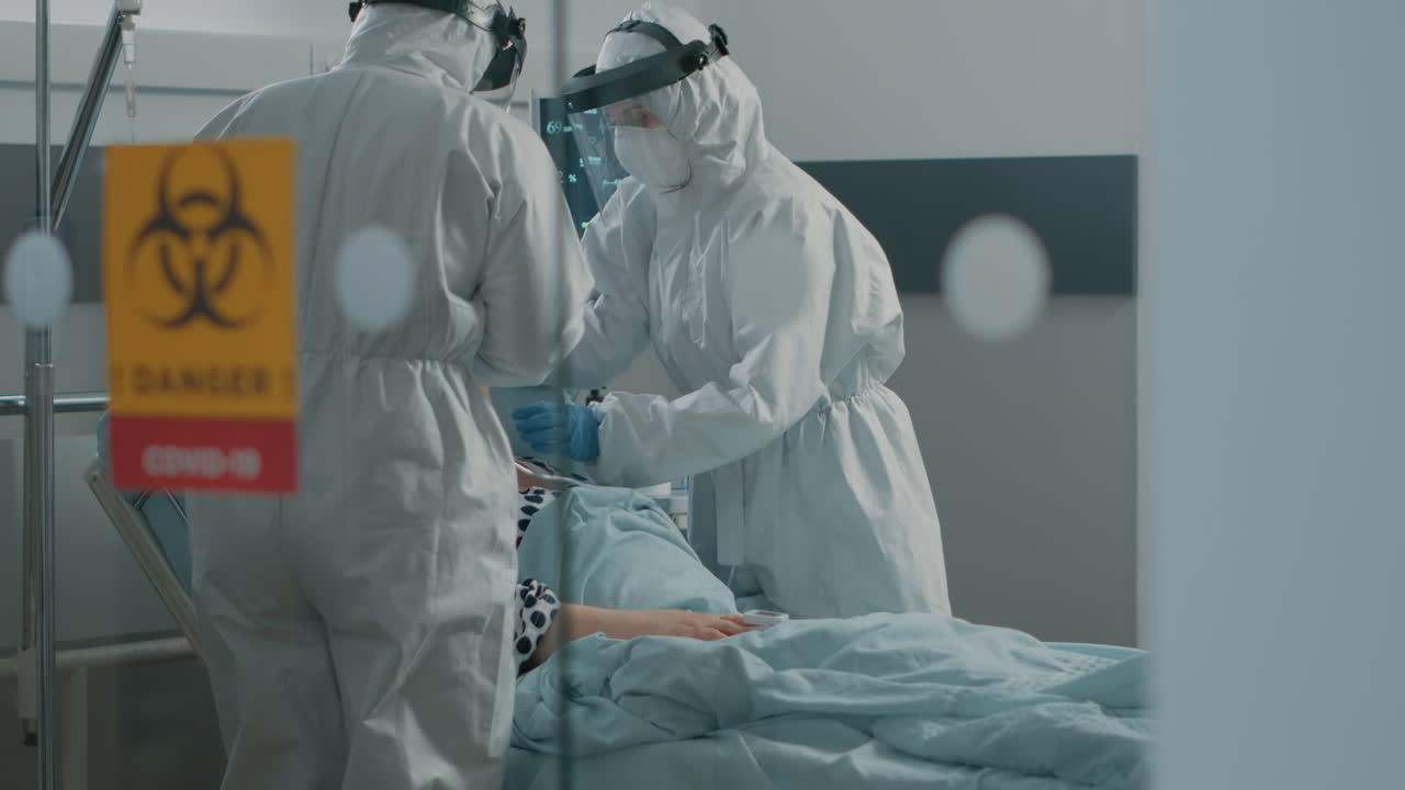 Coronavirus patient asking for medical assistance from team