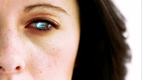 earth turning in slow motion in the eye of a woman with courtesy of nasa.org