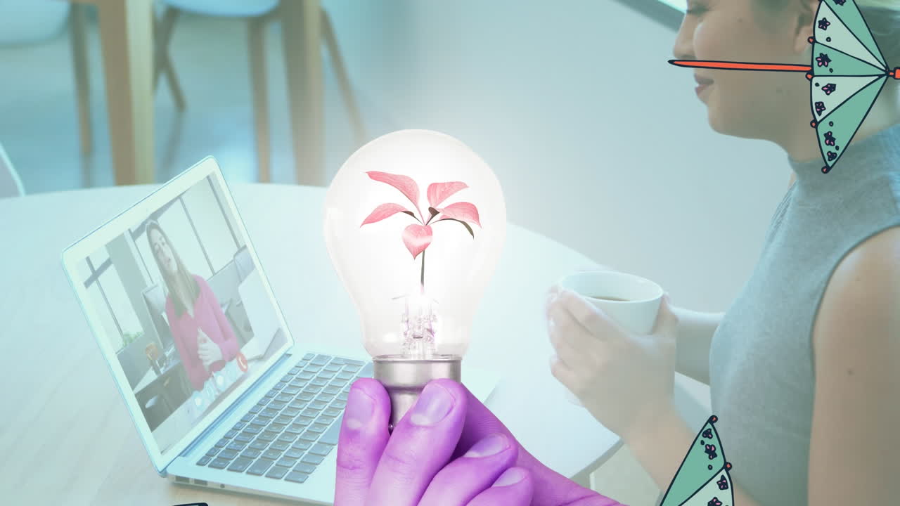 노트북을 사용하는 백인 여성 위에 꽃과 우산이 있는 가 ⁇ 운 장식품의 애니메이션