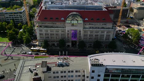 Calm-aerial-view-flight-speed-ramp-Hyperlapse-motionlapse
of-Department-Store-Shopping-Mall-KaDeWe-at-Kudamm-Berlin-Germany-at-summer-day-2022