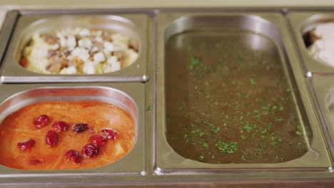 buffet with various dishes in a self-service restaurant. slider shot