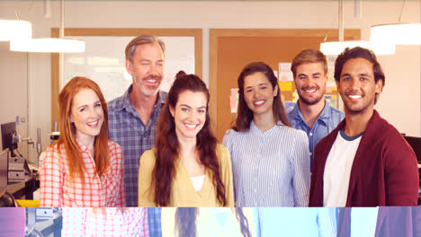 Business-colleagues-standing-together-in-office