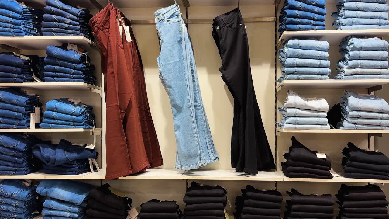 Stacked Denim Pants and Casual Trousers in Modern Apparel Store