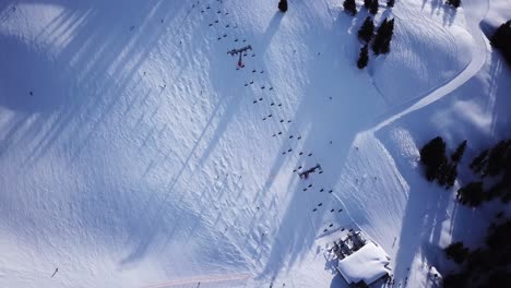 Aerial-view-of-a-ski-slope-in-a-ski-resort-in-the-Tyrolean-Alps-in-Austria