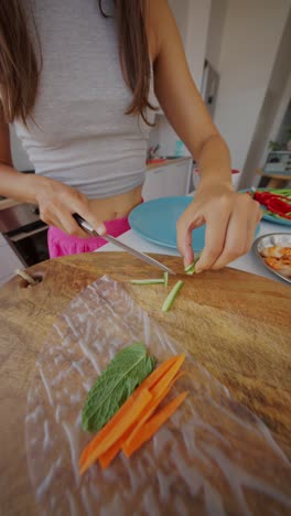 preparing fresh vegetable spring rolls
