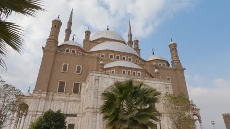 magnificent mosque in citadel of saladin with people walking by. cairo, egypt. low angle