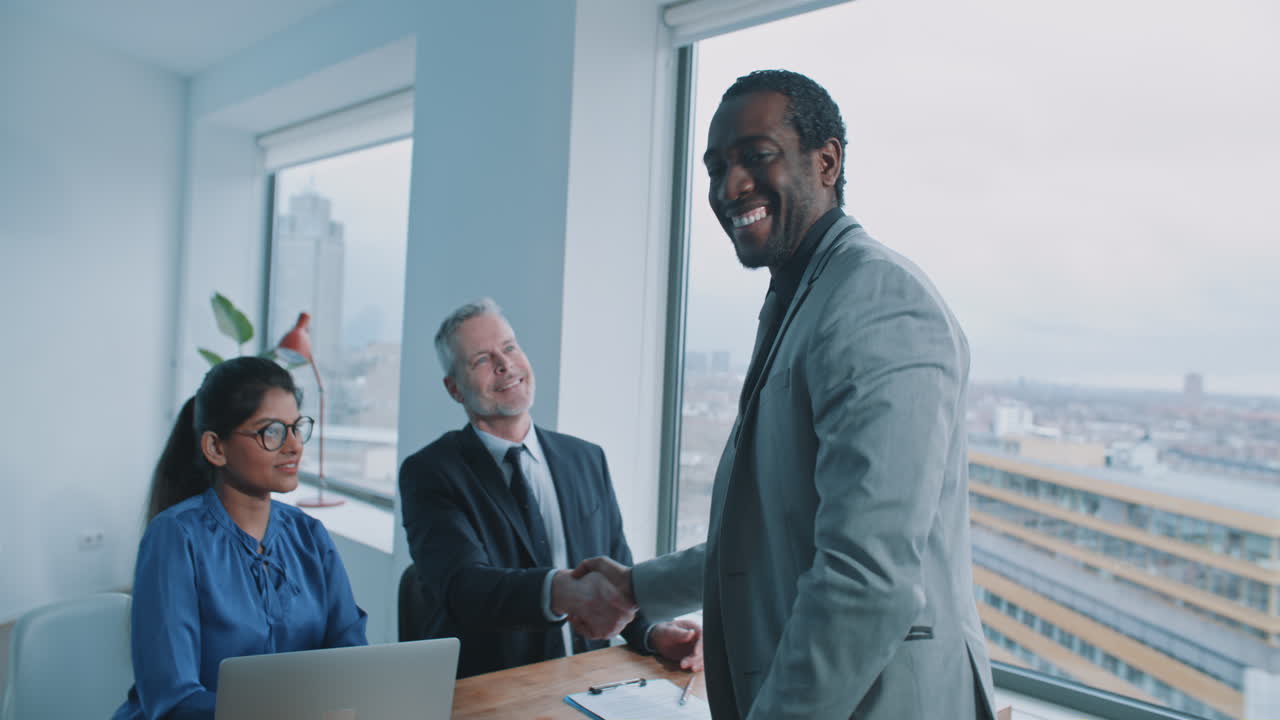 Business Meeting and Handshake