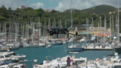 flying dji mavic 3 pro drone with harbor in background