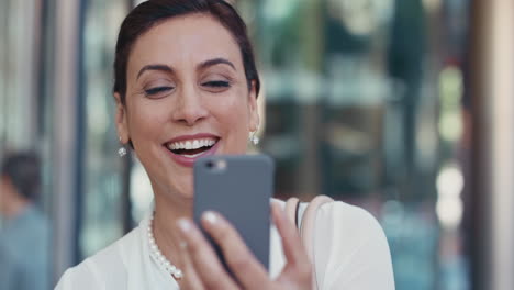 Portrait-of-Middle-Eastern-Businesswoman-outside-corporate-office-building