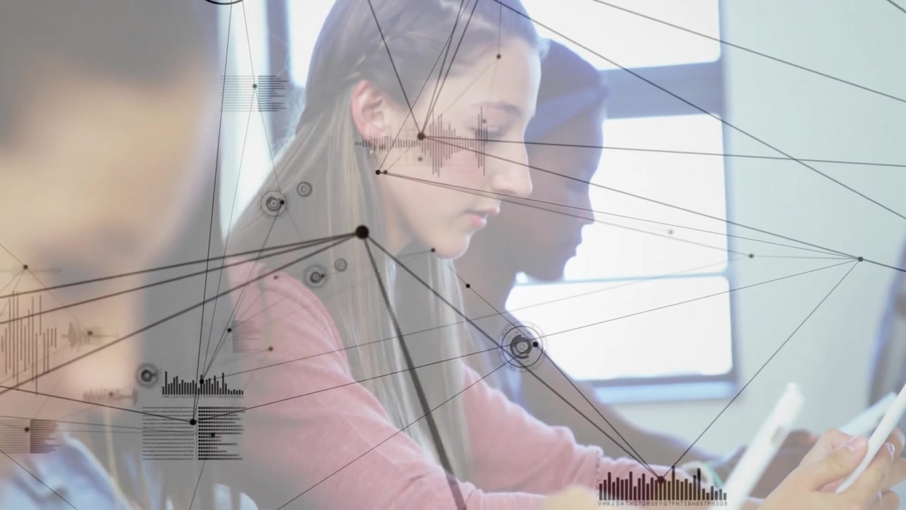 Child tapping tablet and causing data overlay linking classmates during classroom lesson