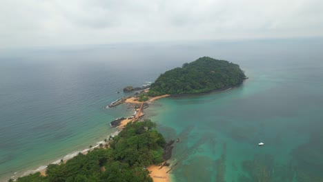 Circular aerial view overlooking the walkway that connects Bom Bom beach to the islet with the same name at Ilha do Principe (Prince Island) Sao tome,Africa