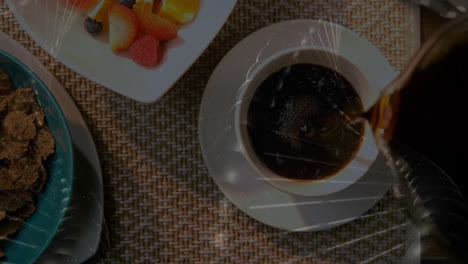 flat design overhead view showing coffee cup being filled beside teal cereal bowl and fruit plate