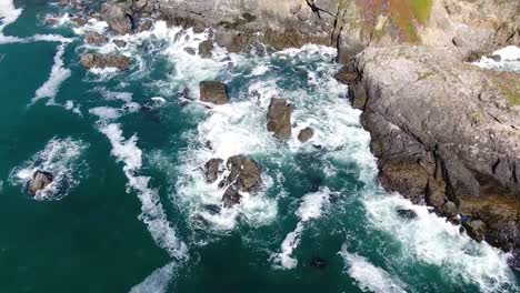 drone video of waves hitting the rocky coastline in bodega bay and gualala coast, california, usa