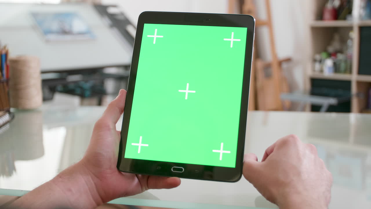 Tablet with green screen for chroma key