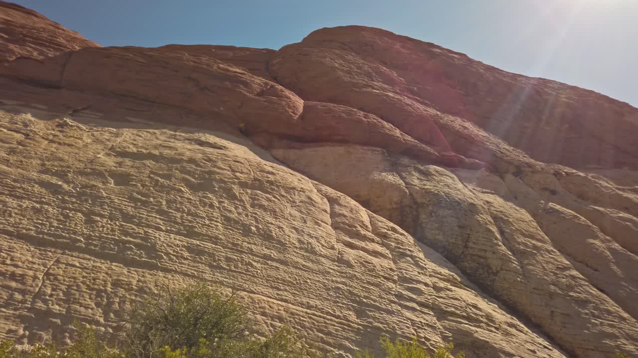 Red sandstone peak view in sunlight