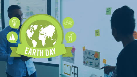 animation of globe and earth day over diverse man and woman brainstorming