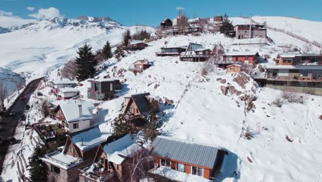 scenic view of cabins over snow-covered village of farellones ski resort near santiago in chile