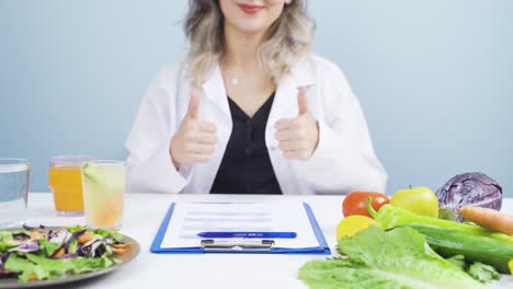 nutritionist laughing at camera.