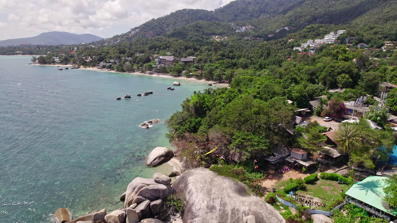 Beautiful 4K drone footage of the beach and unique rock features at Hin Ta Hin Yai Beach on Koh Samui in Thailand