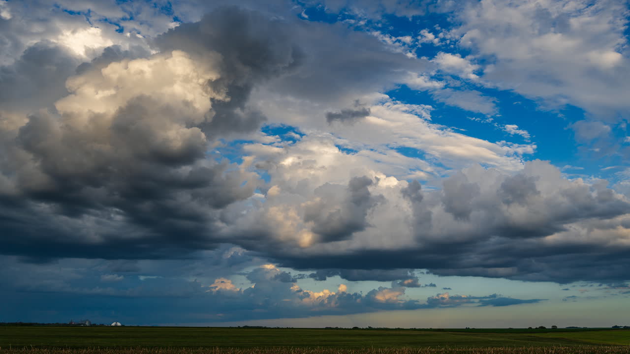 Beautiful and colorful stormy sky with fast moving clouds and dramatic natural atmosphere