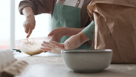 grandma and girl baking