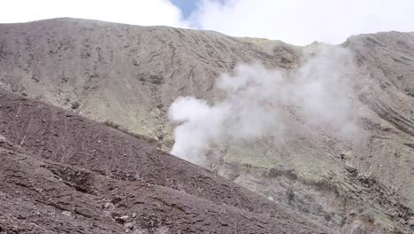 White-smoke-released-from-volcanic-vents-on-Mt-Balbi-volcano-in-remote-destination-of-Bougainville,-Papua-New-Guinea-on-a-challenging-multi-day-hike-and-climb-adventure