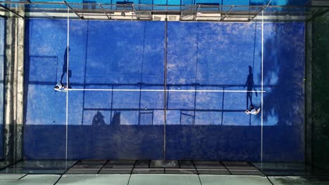 aerial view of padel tennis court with players