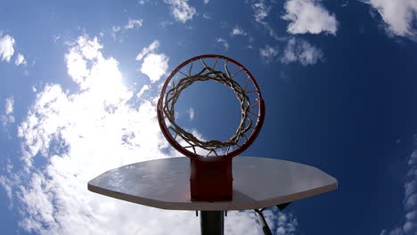 basketball game unique angle of ball being shot into hoop