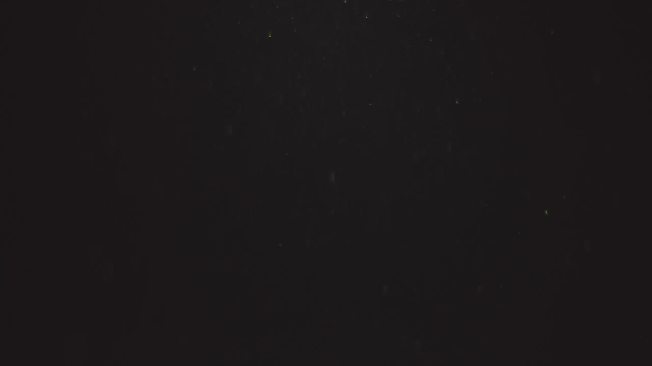 partículas abstractas sobre fondo oscuro