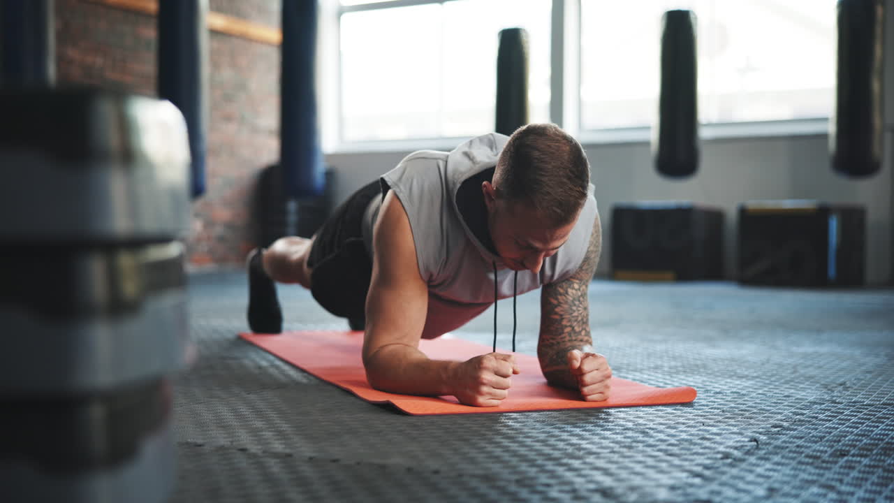 Gym, plank and a man on floor for exercise