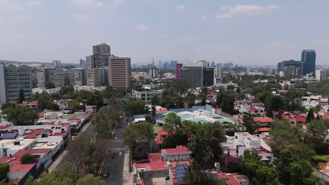 Lifting a drone above a zone in Mexico City on a hot, sunny day