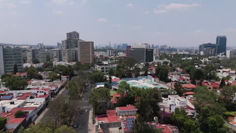lifting a drone above a zone in mexico city on a hot, sunny day