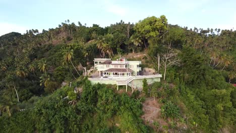 panoramic drone aerial view of a family villa in the mountains near the bay of samana, dominican republic