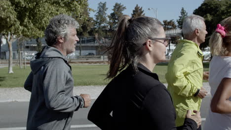 active retired runners jogging outside