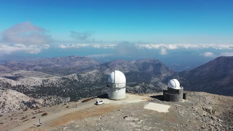 discover the majestic mountains with a drone's eye view of skies and observatory peak