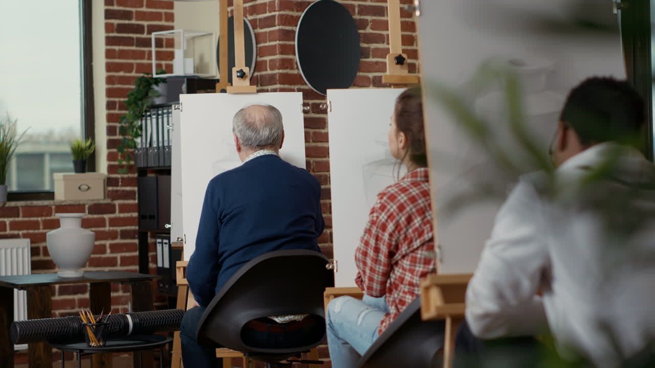 Young person talking to elder man about vase drawing