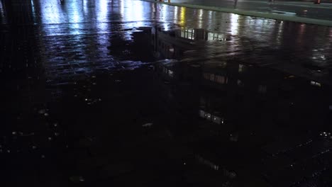 boston sidewalk at night after rainfall