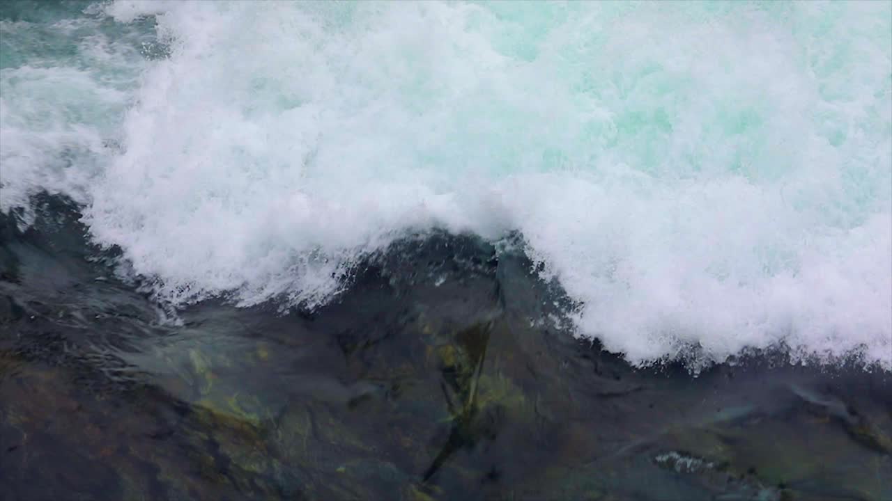 Mountain river water with slow motion closeup