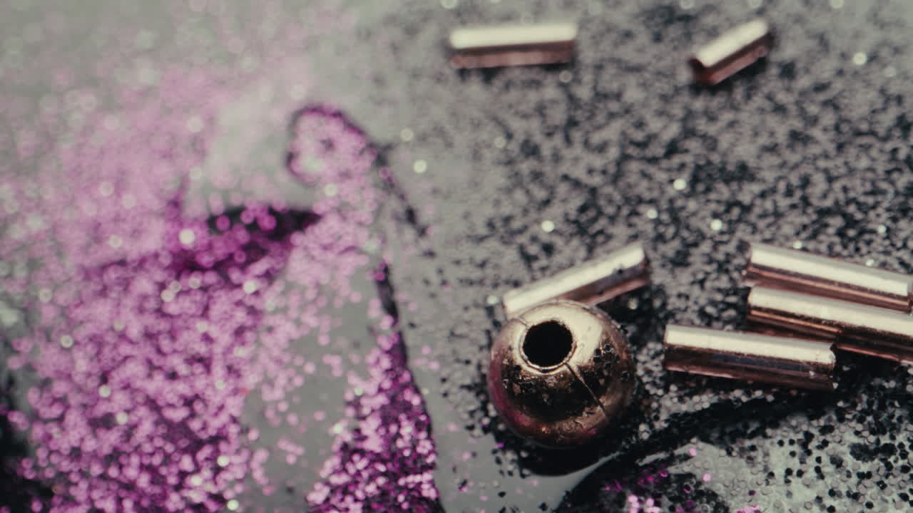 Close-up of Glitter, Beads, and Metal Components