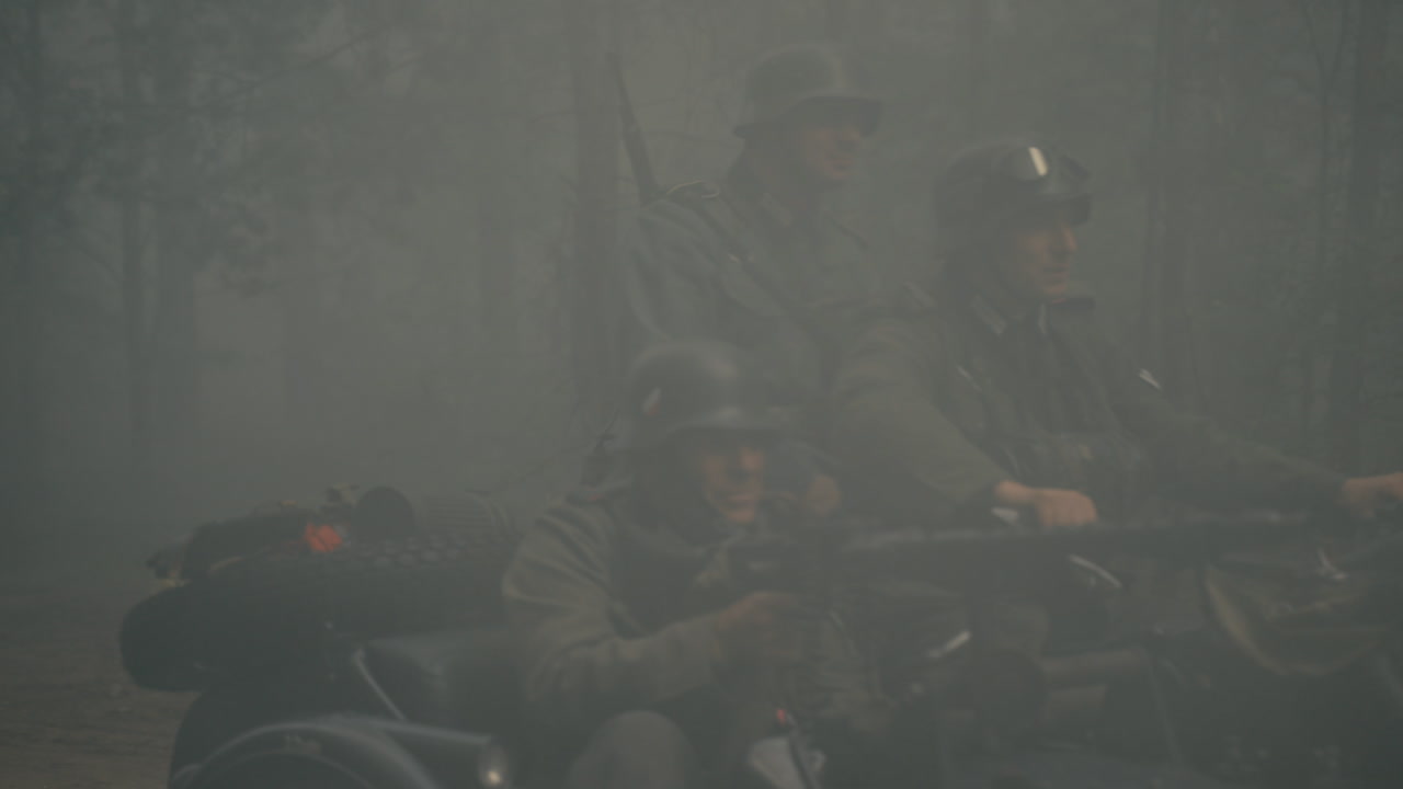 German Soldiers on Motorcycle in Foggy Forest