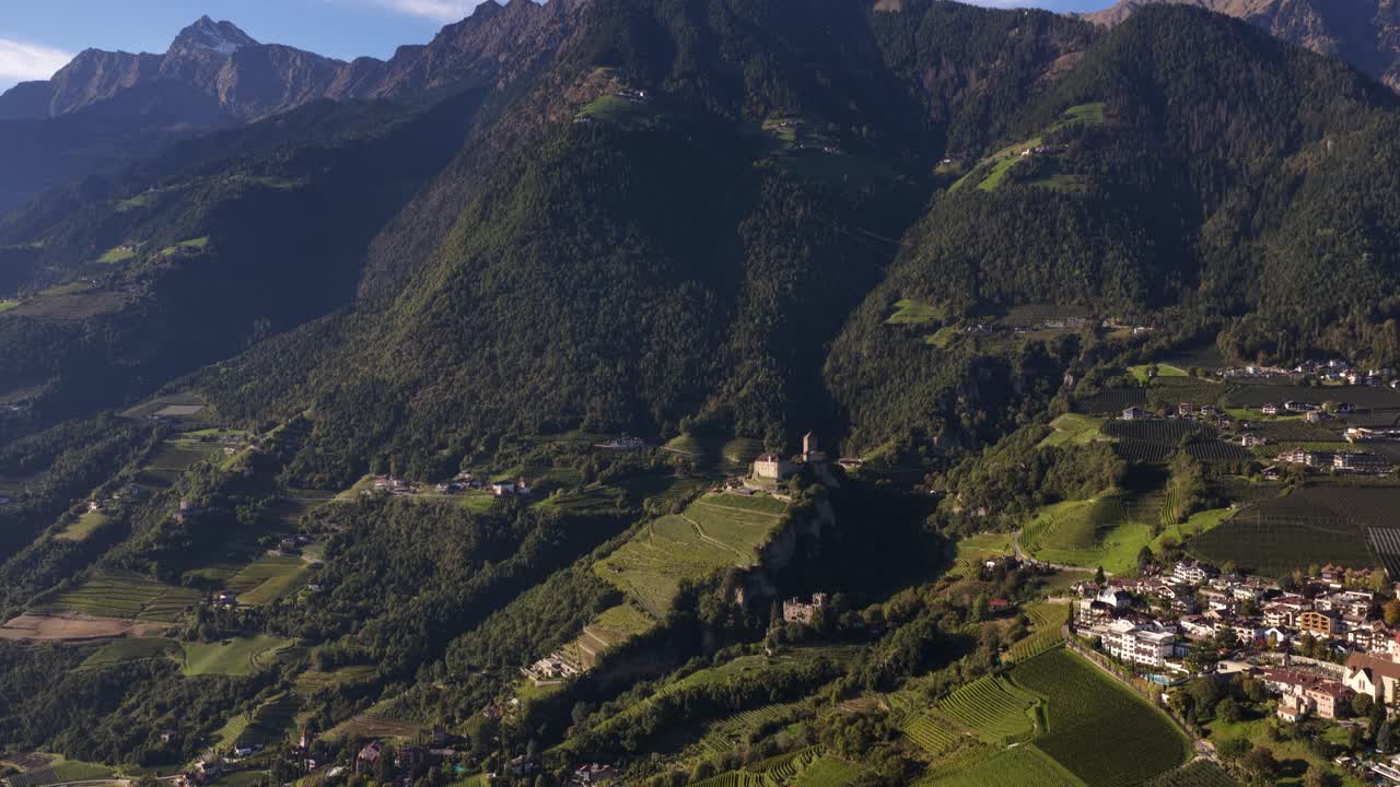 Tyrol castle, and Brunnenburg museum, Meran, Italy, Aerial drone video on summer day