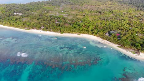 Exotic-white-sandy-beach-and-coral-reef-in-Madagascar