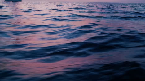 sunset/sunrise at sea with sailboat