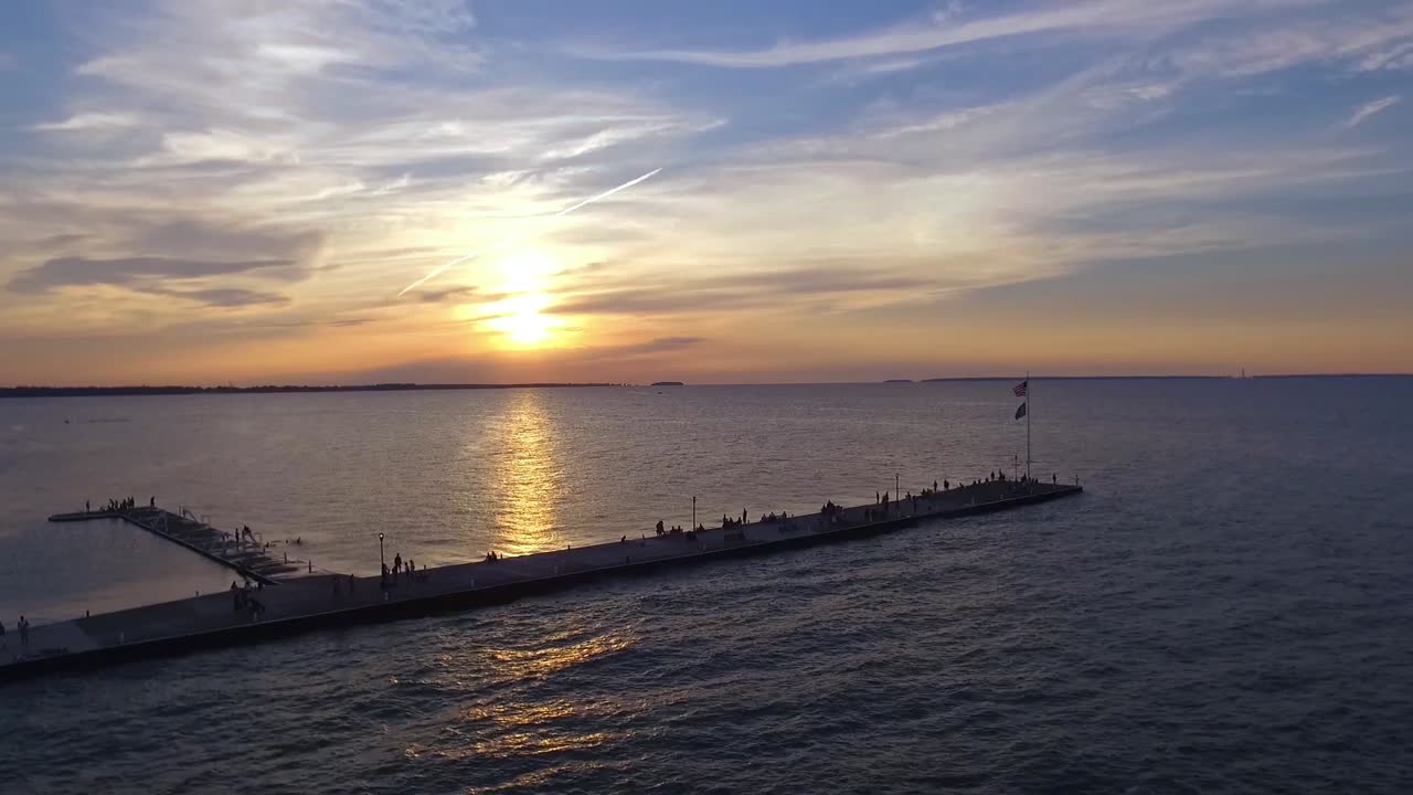Drone Sunset Pier over Lake with People