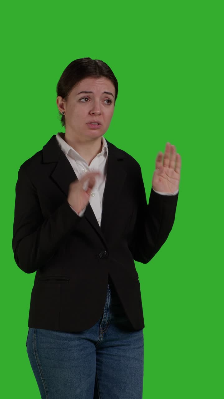 Vertical video: Side view of young angry businesswoman acting negative and furious
