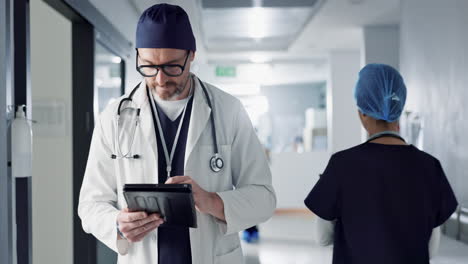 Surgeon,-doctor-and-tablet-for-hospital