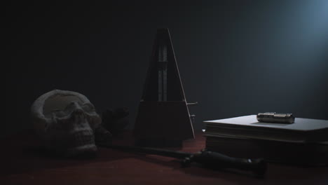metronome set the rythm in the dark, old room