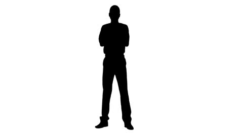 Silhouette-of-businessman-standing-with-arms-crossed